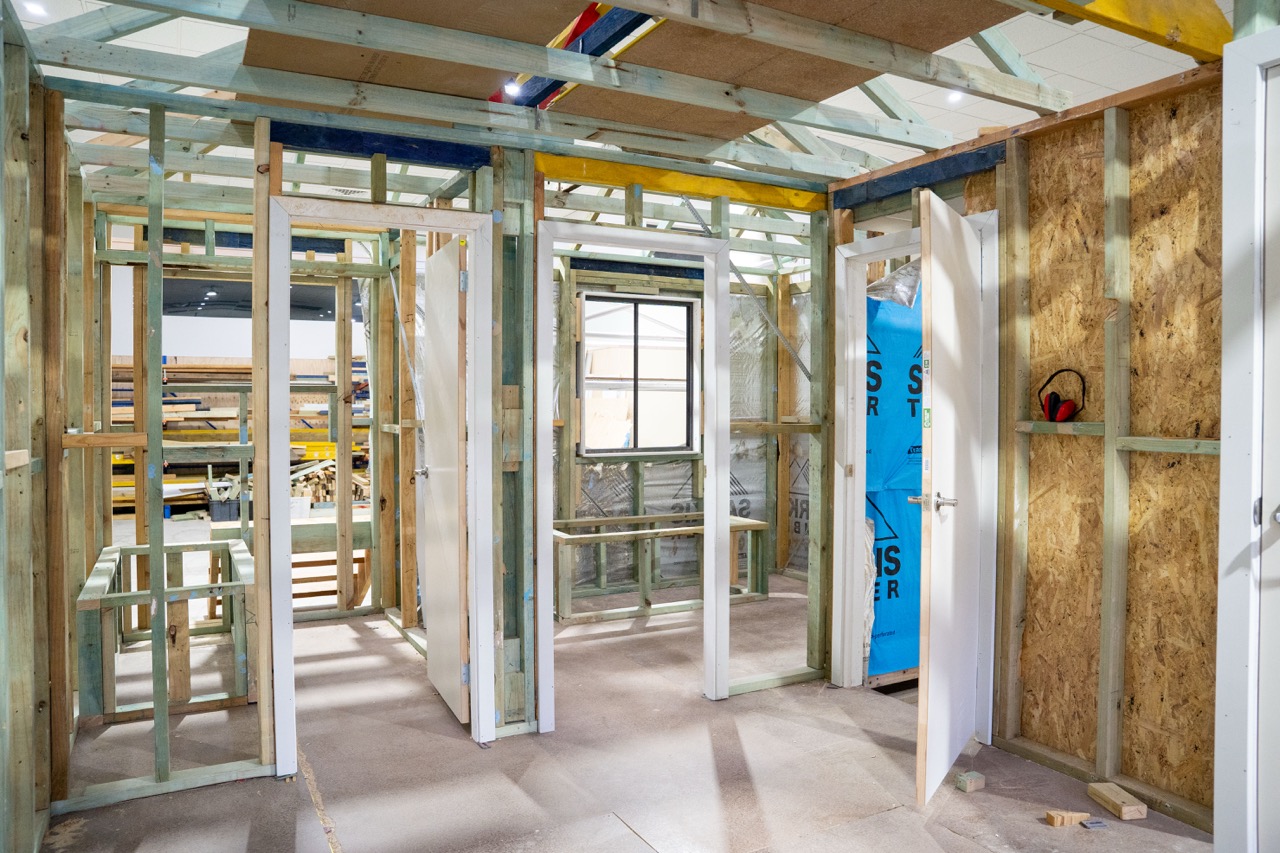 Internal carpentry fit-out training area with doors and wall frames