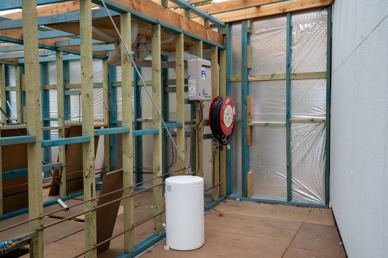 Hot water system and plumbing services training facility